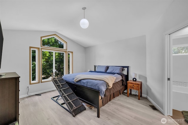 6218 199th Street Ct E, Spanaway, WA 98387 - bedroom with lofted ceiling and light wood-style floors