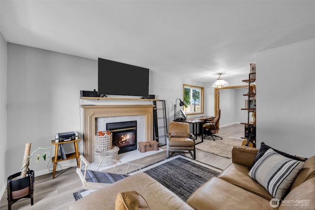 6218 199th Street Ct E, Spanaway, WA 98387 - living area featuring wood finished floors and a tiled fireplace