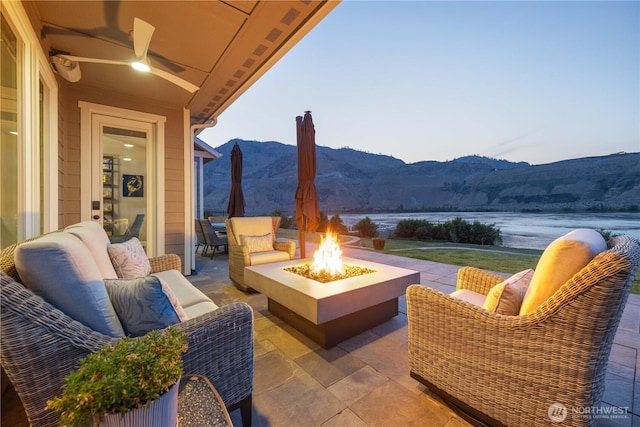 167 N Shore Dr, Orondo, WA 98843 - view of patio / terrace featuring an outdoor living space with a fire pit and a water and mountain view
