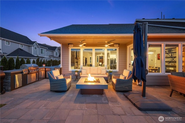 167 N Shore Dr, Orondo, WA 98843 - view of patio featuring an outdoor living space with a fire pit, area for grilling, and ceiling fan