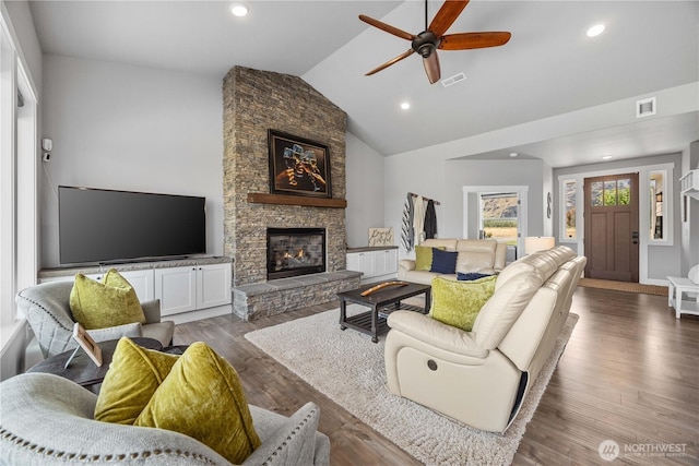 167 N Shore Dr, Orondo, WA 98843 - living area featuring ceiling fan, lofted ceiling, a stone fireplace, wood finished floors, and recessed lighting