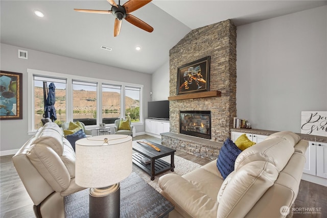167 N Shore Dr, Orondo, WA 98843 - living area featuring wood finished floors, ceiling fan, a fireplace, recessed lighting, and high vaulted ceiling