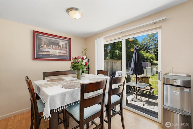643 School St SE, Lacey, WA 98503 - dining area with light wood-style floors and baseboards