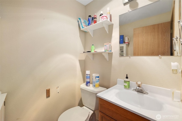 643 School St SE, Lacey, WA 98503 - bathroom featuring vanity and toilet