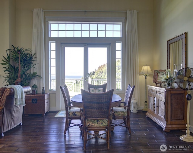 30 Chauncey Ln W, Pacific Beach, WA 98571 - dining space featuring baseboards and dark wood-type flooring