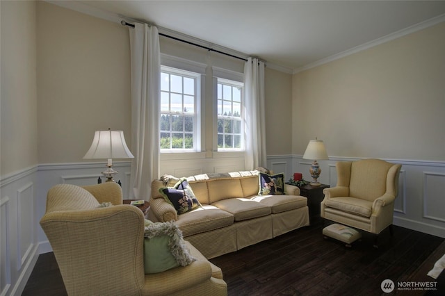30 Chauncey Ln W, Pacific Beach, WA 98571 - living area with a decorative wall, a wainscoted wall, wood finished floors, and crown molding
