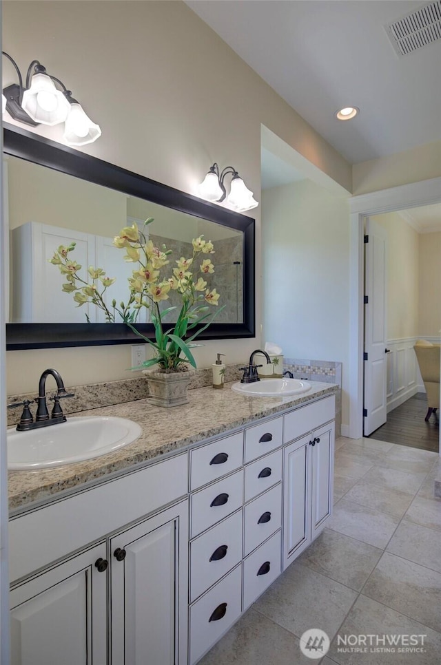 30 Chauncey Ln W, Pacific Beach, WA 98571 - bathroom with double vanity, tile patterned flooring, and recessed lighting