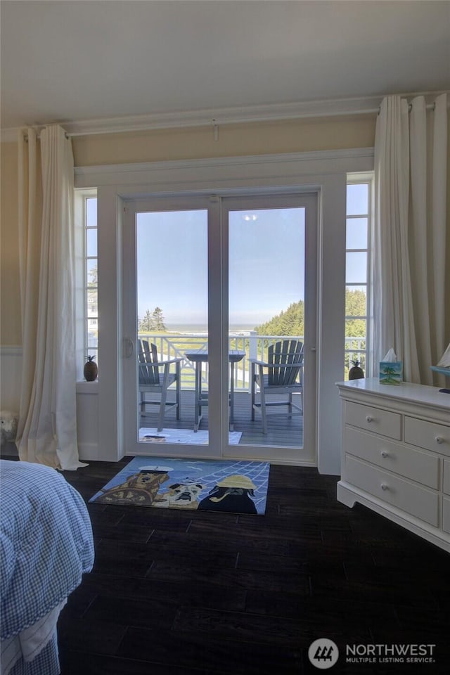 30 Chauncey Ln W, Pacific Beach, WA 98571 - bedroom featuring access to exterior and dark wood-style floors