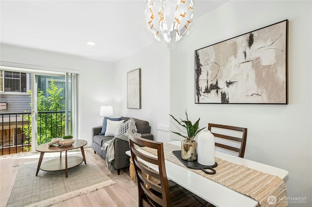 4795 35th Ave S Unit B, Seattle, WA 98118 - dining space with a chandelier, wood finished floors, and recessed lighting