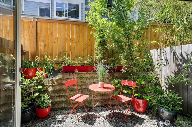 4795 35th Ave S Unit B, Seattle, WA 98118 - fenced backyard with a patio