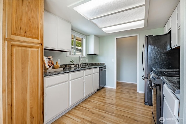 8380 Grouse Crescent Dr, Blaine, WA 98230 - kitchen featuring range with electric stovetop, a sink, light wood-type flooring, white cabinetry, and dishwasher