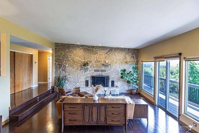 21424 Calhoun Rd, Monroe, WA 98272 - living room featuring a fireplace and dark wood-type flooring
