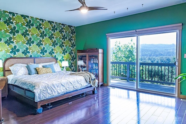 21424 Calhoun Rd, Monroe, WA 98272 - bedroom featuring access to exterior, wood finished floors, wallpapered walls, and ceiling fan