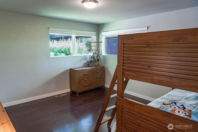 21424 Calhoun Rd, Monroe, WA 98272 - bedroom featuring baseboards and dark wood-style flooring
