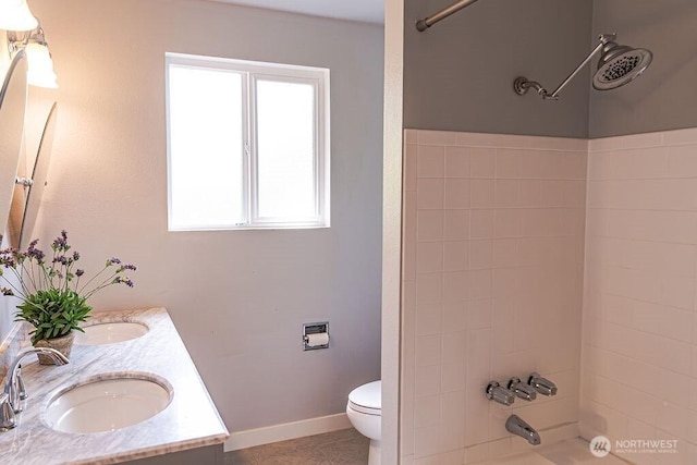 21424 Calhoun Rd, Monroe, WA 98272 - full bath featuring shower / bathtub combination, double vanity, and tile patterned flooring