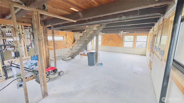 2403 Sunlight Beach Rd, Clinton, WA 98236 - basement featuring stairway and wooden walls