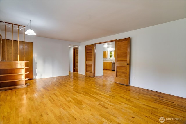 1202 Brookdale Rd E, Tacoma, WA 98445 - unfurnished room featuring light wood-type flooring