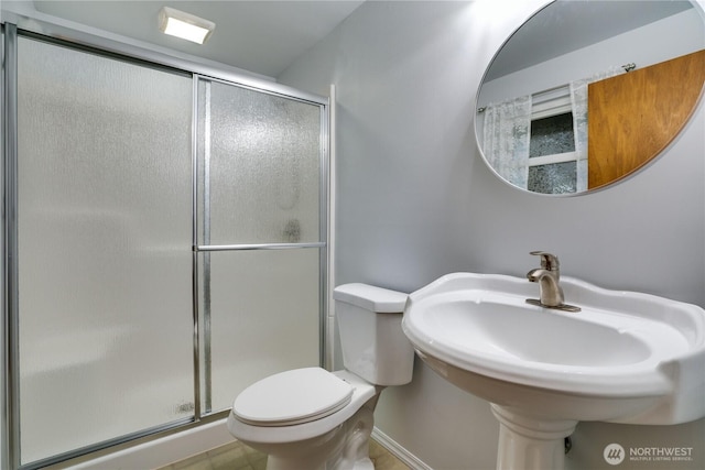 1202 Brookdale Rd E, Tacoma, WA 98445 - bathroom featuring a stall shower and toilet