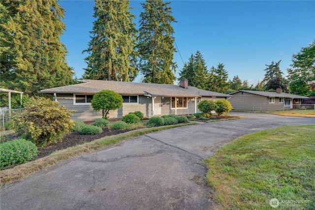 1202 Brookdale Rd E, Tacoma, WA 98445 - single story home with a chimney