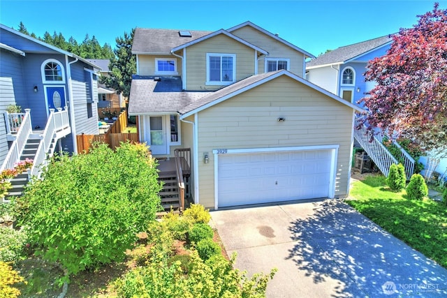 3929 152nd Pl SE, Bothell, WA 98012 - traditional home featuring stairs, concrete driveway, and a shingled roof
