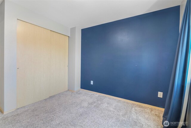 3929 152nd Pl SE, Bothell, WA 98012 - unfurnished bedroom featuring carpet and a closet