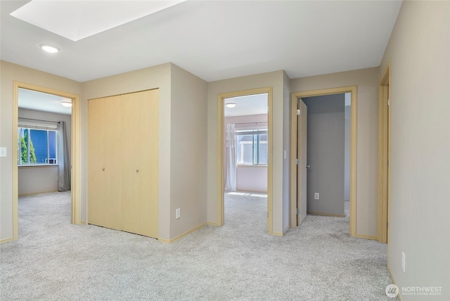 3929 152nd Pl SE, Bothell, WA 98012 - hall with carpet floors, a skylight, healthy amount of natural light, and recessed lighting
