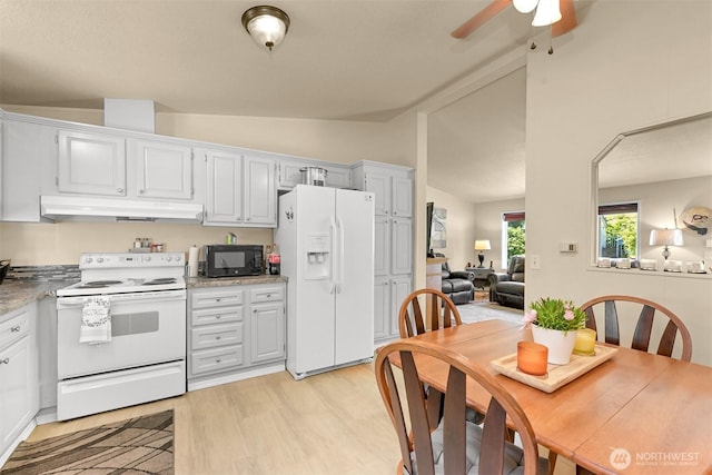 2174 Yew Street Rd Unit 22, Bellingham, WA 98229 - kitchen with white appliances, under cabinet range hood, vaulted ceiling, light wood-type flooring, and ceiling fan