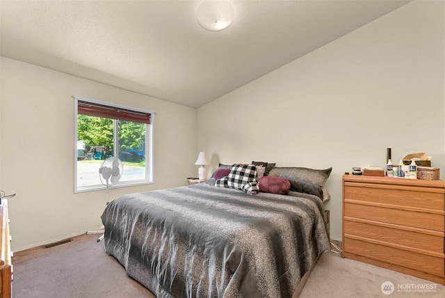 2174 Yew Street Rd Unit 22, Bellingham, WA 98229 - bedroom with light colored carpet and vaulted ceiling