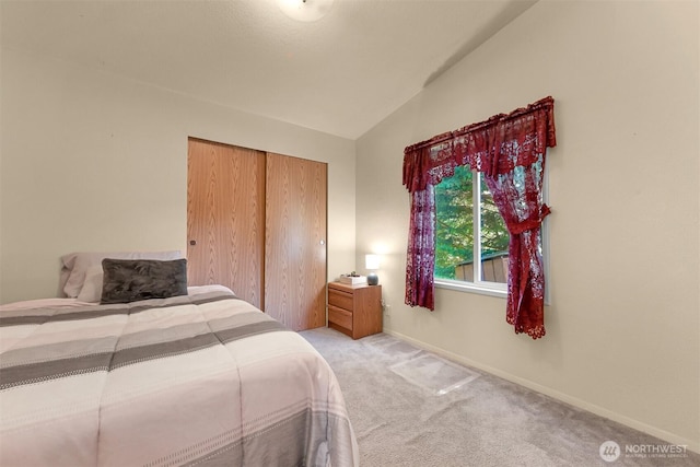 2174 Yew Street Rd Unit 22, Bellingham, WA 98229 - bedroom featuring carpet flooring, lofted ceiling, and a closet
