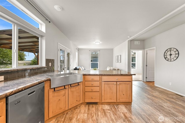 3664 N Red River Rd, Ferndale, WA 98248 - kitchen with dishwasher, light wood-type flooring, a peninsula, open floor plan, and tasteful backsplash