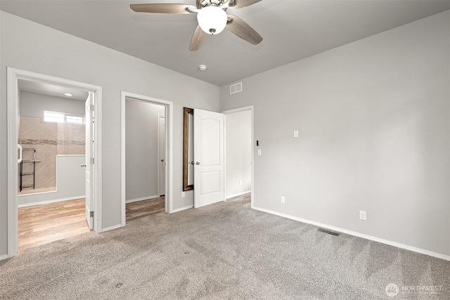 3664 N Red River Rd, Ferndale, WA 98248 - unfurnished bedroom with carpet flooring, a spacious closet, ensuite bathroom, a ceiling fan, and a closet