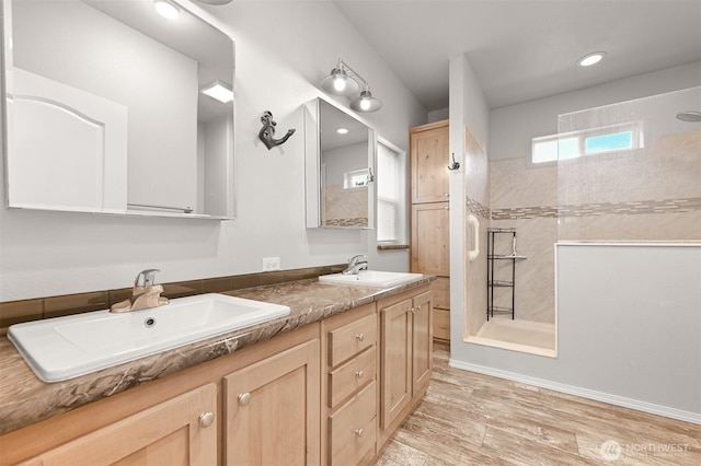 3664 N Red River Rd, Ferndale, WA 98248 - bathroom with double vanity, walk in shower, and wood finished floors
