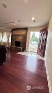 19604 108th Ave SE, Kent, WA 98055 - living area featuring wood finished floors, recessed lighting, and a fireplace with raised hearth
