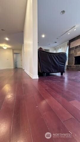 19604 108th Ave SE, Kent, WA 98055 - living area featuring wood-type flooring and a fireplace with raised hearth