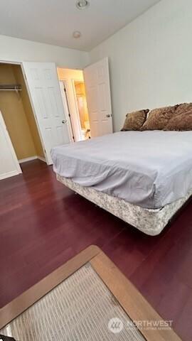 19604 108th Ave SE, Kent, WA 98055 - bedroom featuring dark wood-style flooring and baseboards