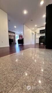 19604 108th Ave SE, Kent, WA 98055 - unfurnished living room with speckled floor and recessed lighting