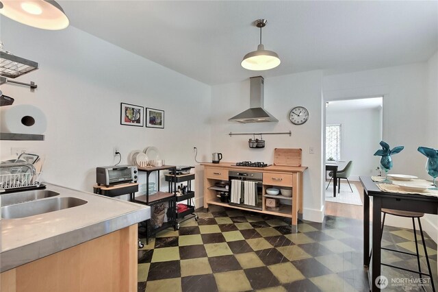 3824 S G St, Tacoma, WA 98418 - kitchen featuring wall chimney range hood, black appliances, dark floors, decorative light fixtures, and light countertops