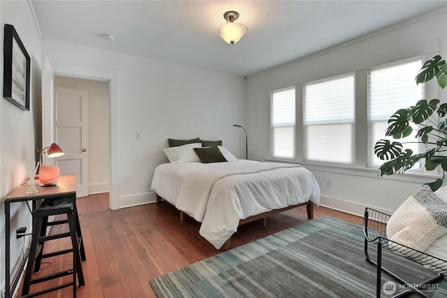 3824 S G St, Tacoma, WA 98418 - bedroom with baseboards and wood-type flooring