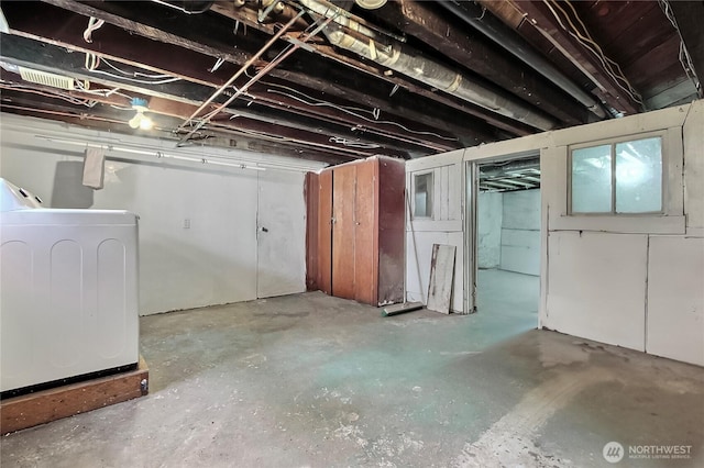 3824 S G St, Tacoma, WA 98418 - unfinished below grade area featuring washer / clothes dryer
