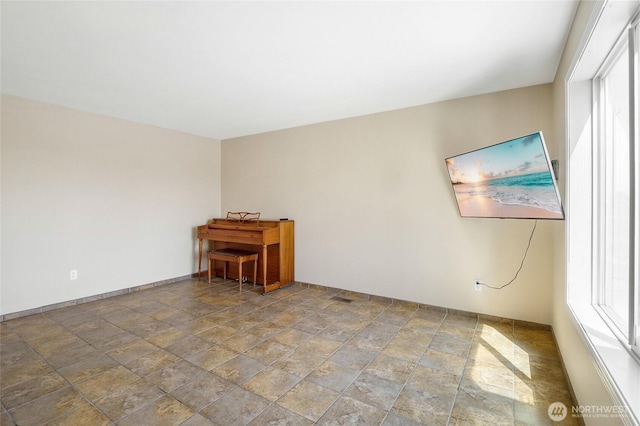 2352 W Covey Dr, Othello, WA 99344 - unfurnished room with stone tile flooring and baseboards