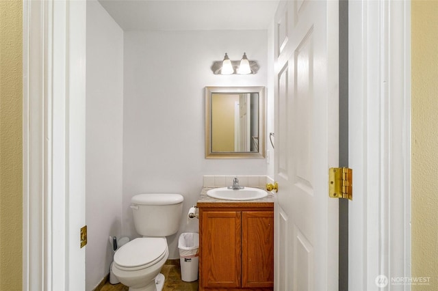 2352 W Covey Dr, Othello, WA 99344 - half bathroom featuring vanity and toilet