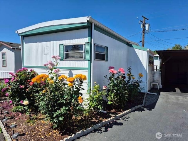 5626 SW 113th Ave E Unit 63, Puyallup, WA 98372 - view of side of home
