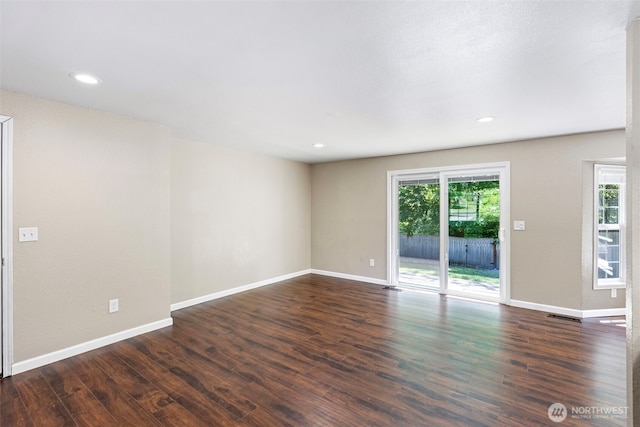 3903 Westpark Ct NW, Olympia, WA 98502 - empty room featuring plenty of natural light, dark wood-style floors, and recessed lighting