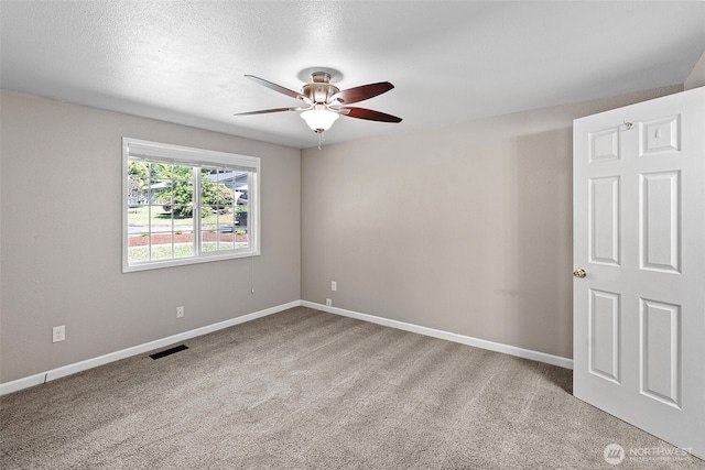 3903 Westpark Ct NW, Olympia, WA 98502 - empty room featuring a ceiling fan and carpet