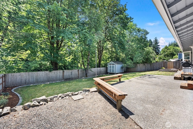 3903 Westpark Ct NW, Olympia, WA 98502 - fenced backyard featuring a storage unit and a patio