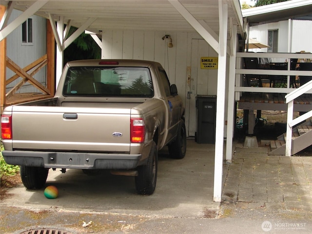 900 29th St SE Unit C-8, Auburn, WA 98002 - view of car parking featuring a carport
