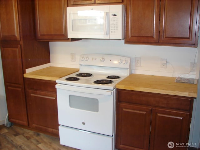 900 29th St SE Unit C-8, Auburn, WA 98002 - kitchen featuring white appliances and wood finished floors