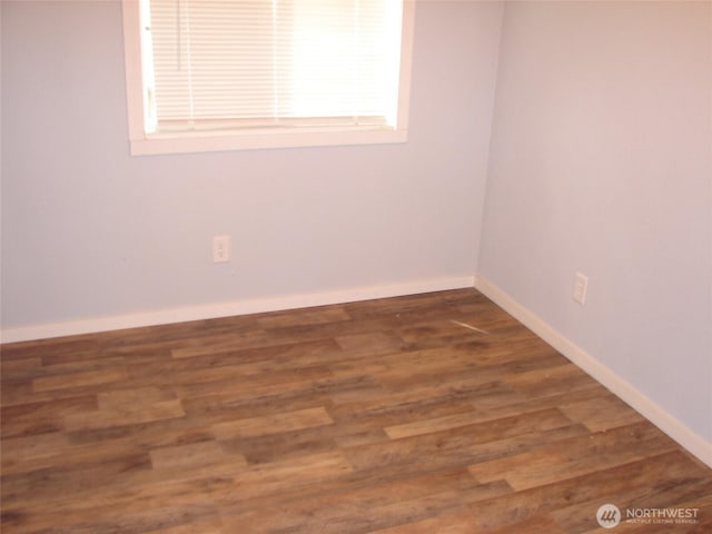 900 29th St SE Unit C-8, Auburn, WA 98002 - spare room with baseboards and wood finished floors