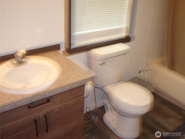 900 29th St SE Unit C-8, Auburn, WA 98002 - full bath with vanity, tub / shower combination, and wood finished floors