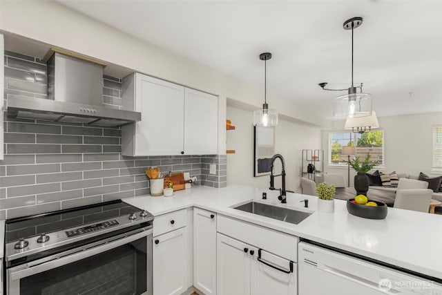 2401 SW Brandon St Unit 210, Seattle, WA 98106 - kitchen with electric range, wall chimney exhaust hood, dishwasher, decorative backsplash, and light countertops